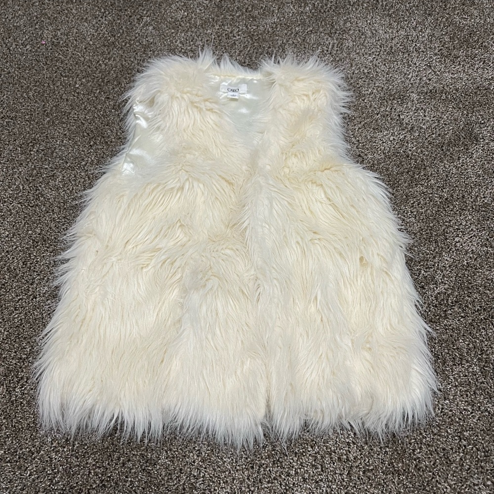 Like new faux fur white vest. Size small.